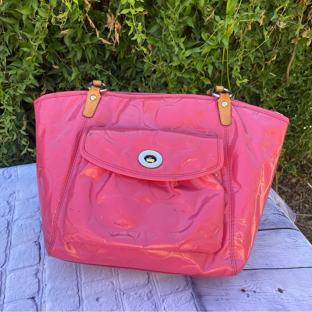 Embossed coach tote